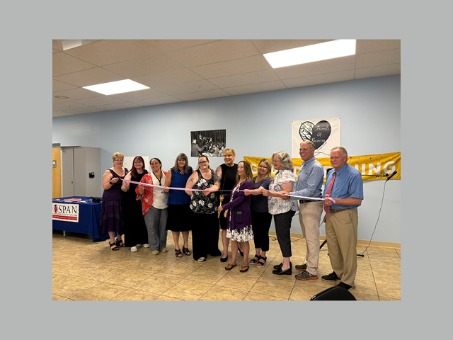 From left Board Member of Friends of Recovery Oswego County Christine Provost, Staff Member Abby Sweeney, Board Member Megan Walradth, Oswego Co. Dept. of Mental Hygiene Nicole Kolmsey, Board Member Jessica Woolworth, Board President Ellen Lazaraek, Founder and Board Member Teresa Woolson, Member Trisha DeWolf, Executive Director Virginia Bough, Leader Barclay, and City of Fulton Mayor Jim Rice.