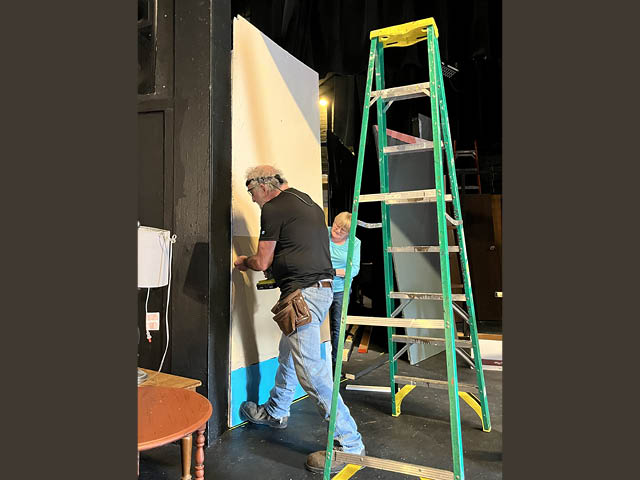 Ken Snow at work on a set