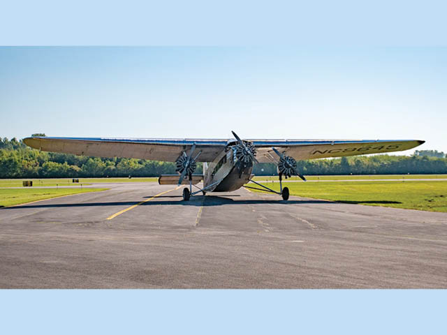 A vintage aircraft on the tarmac at Oswego County Airport 