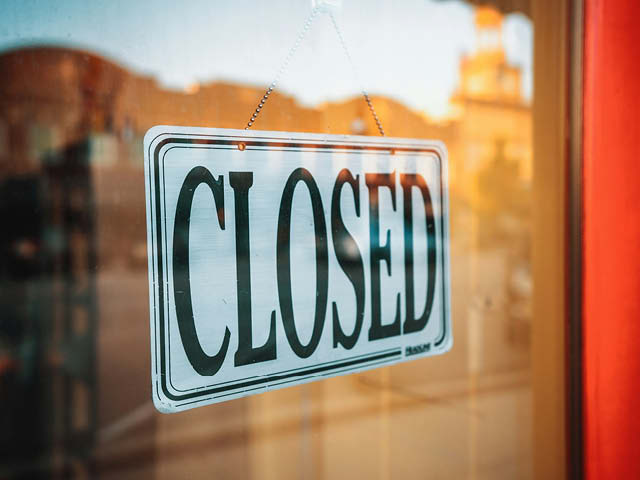 Closed sign in a shop window