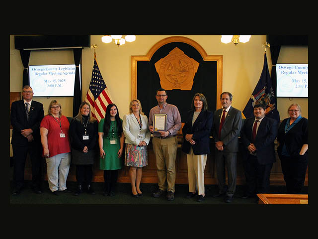 Tourism staff with membes of the County Legislature