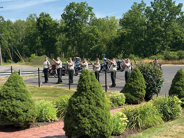 Military veterans offering a seven-gun salute outside of the Phoenix VFW