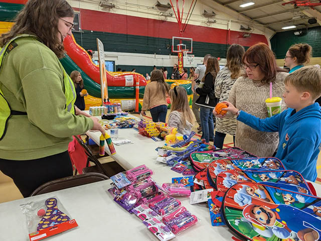 Children enjoy selecting prizes at the Fulton Fall Festival’s kids’ activity area, sponsored by Price Chopper/Market 32.