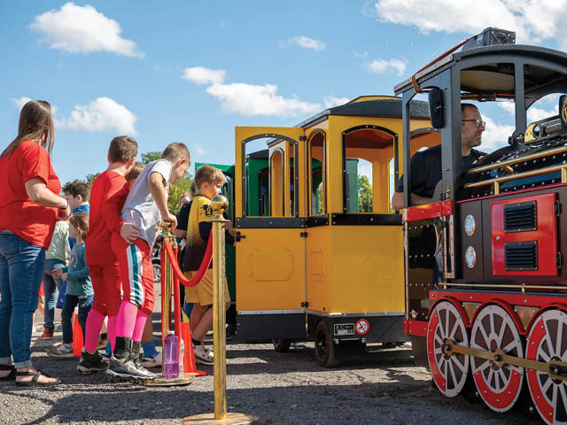 Event attendees board the free trackless train ride at last year's Fulton Fall Festival.