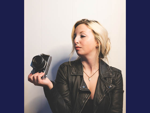 Rachelle Closs holding a camera