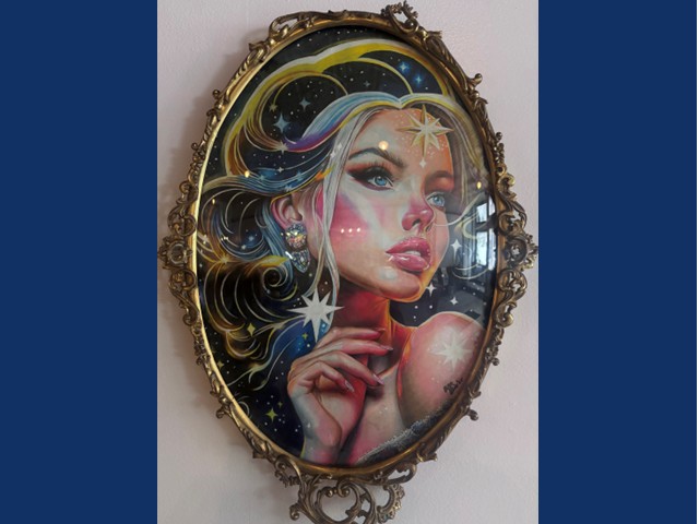 Colored drawing of a beautiful woman with stars around her