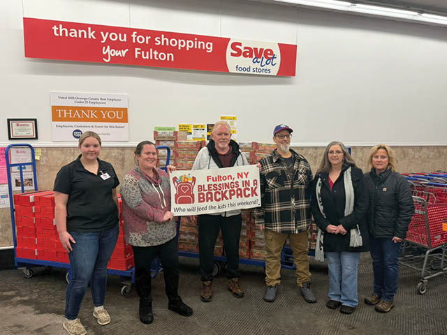 Blessings in a Backpack volunteers and Elks members at the Fulton Save-A-Lot
