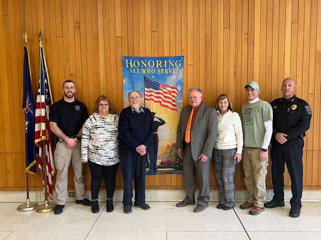 The Fulton Memorial Day Salute Parade will be held on Saturday, May 23.  Pictured from left are Fulton Police Sgt. David Hall, Committee Member Nancy Cavalier, Veteran of the Year and Parade Grand Marshal, the Rev. George Reed, Mayor Jim Rice, Committee Member MaryAnn Hayle, Committee Member Nate Smith, and Fulton Police Chief Christian Dempsey.