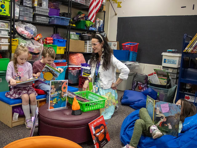 Cernaro (center) in the classroom teaching