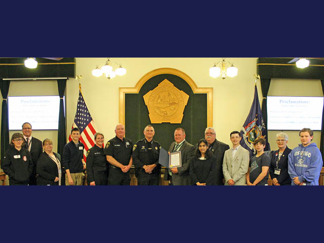 Group photo in the legislative chambers