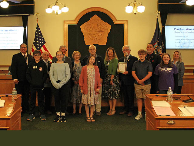 Pictured from left are legislators Frank Bombardo, District 7; Gunnar Weber; Joseph Arduini, District 22; Elizabeth Whitehead; Richard Kline, District 12; Karen O’Brien; Kendal LaMacchia; James O’Brien; OFA Director Sara Sunday; Committee Chairman Michael Solowy, District 23; Aiden Kingsley; Ryan Taylor, District 25; Rhyan Schneider; and Committee Vice Chairwoman Noelle Salmonsen, District 21. 