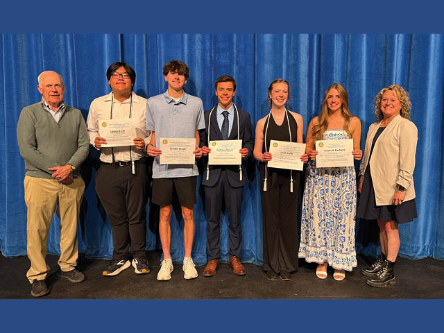 Pictured are: Rotarian Terry Gorman, Leonard Lin, Brodie Wood, Andrew Shaver, Leah Kelly, Hannah Barbera, and Rotarian Carrie Penoyer. 