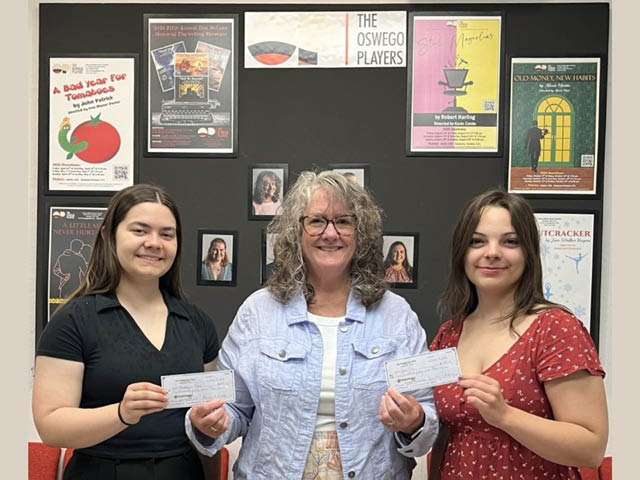 Pictured are the Oswego Players 2026 scholarship winners Maddy Tunis (l) and Cali Tice (r) accepting their award from Players President Tammy Thompson.