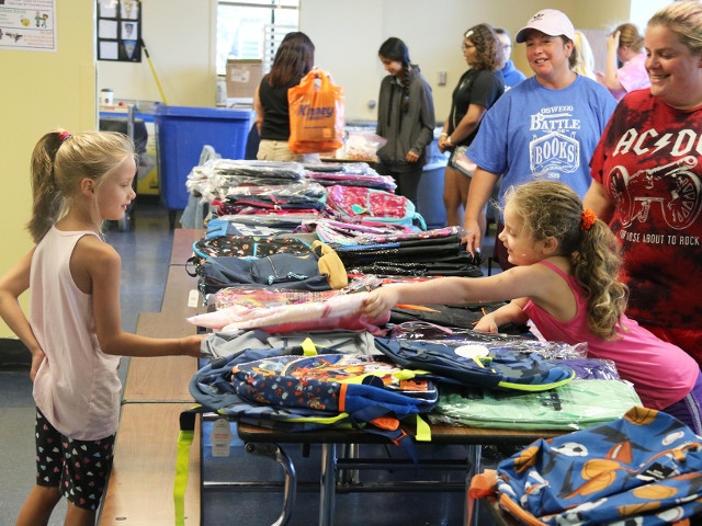 Stuff-A-Bus Event Provides School Supplies for Hundreds of Oswego Children
