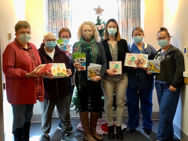 Children's Board of Oswego Donates Baby Books to Oswego Hospital