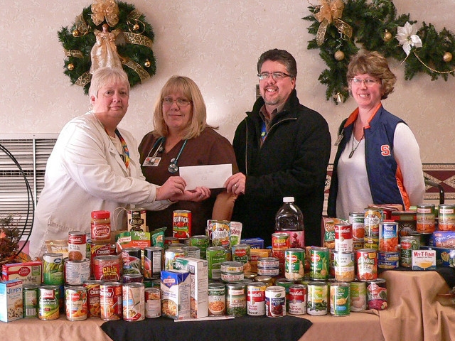 St. Luke Employees Make Donations In Support of Catholic Charities