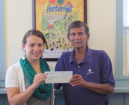 First Harborfest 50/50 winner claims prize