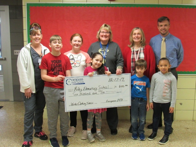 Compass FCU Donates Over $8,000 to Oswego, Fulton Schools for Winter Clothing Needs