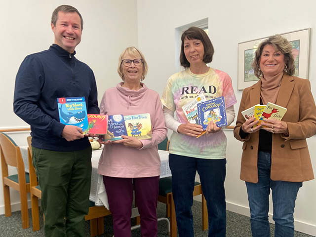 Faith United Church Donates Board Books to Oswego Bookmobile