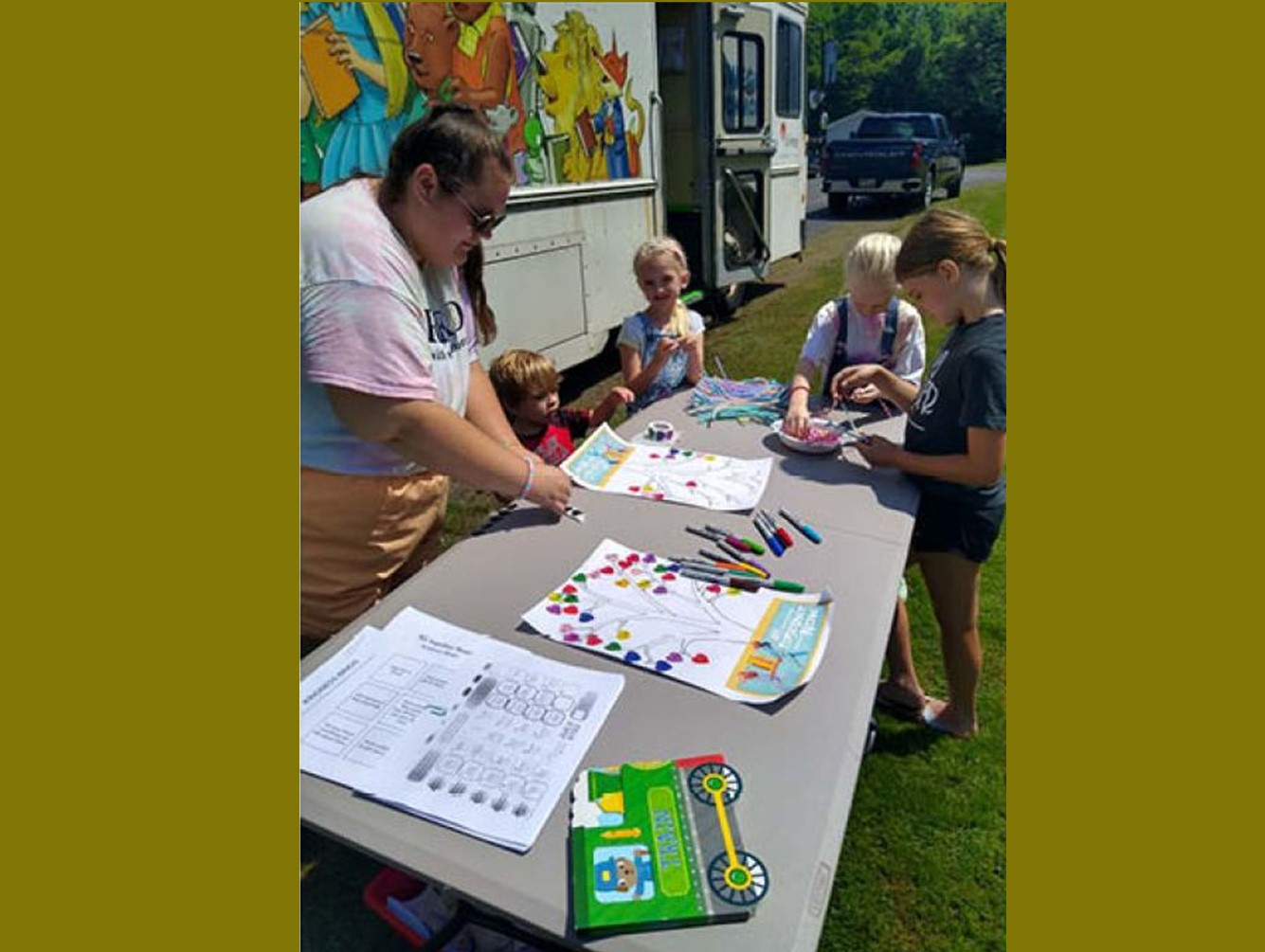 Winter Club Donates $850 to Oswego Bookmobile, Inc.