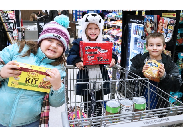 Lanigan 2nd Graders Calculate Holiday Help