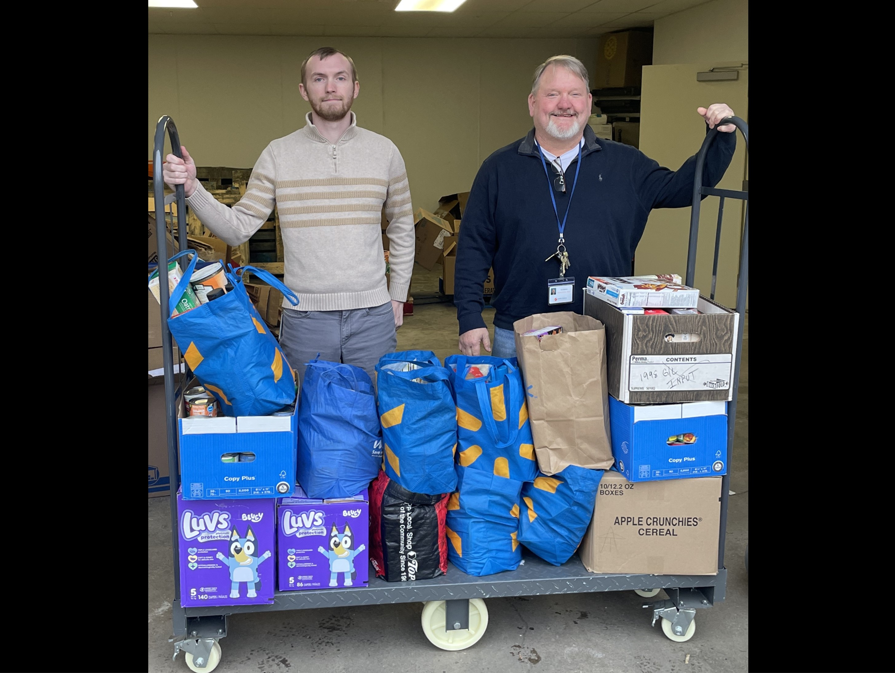 Oswego Industries and Arc of Oswego Employees Donate to Catholic Charities Food Pantry