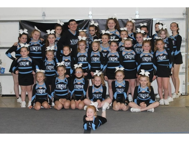 Xtreme Cheer of Oswego's Coach: Amber Raymond