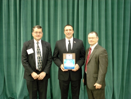 Operation Oswego County presents award to the Novelis Corporation
