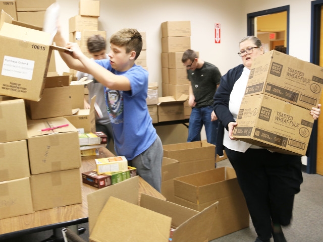 OHS Wrestlers Show Teamwork Off Mat to Help Community