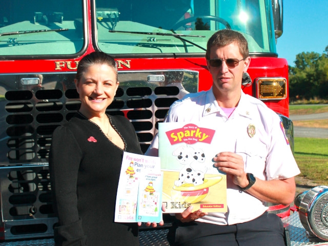 Lake State Farm Agency Donates Family Fire Safety Materials to Fulton FD