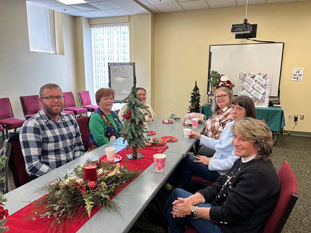 Friends of Oswego Library Treat Staff to an Early Holiday Celebration