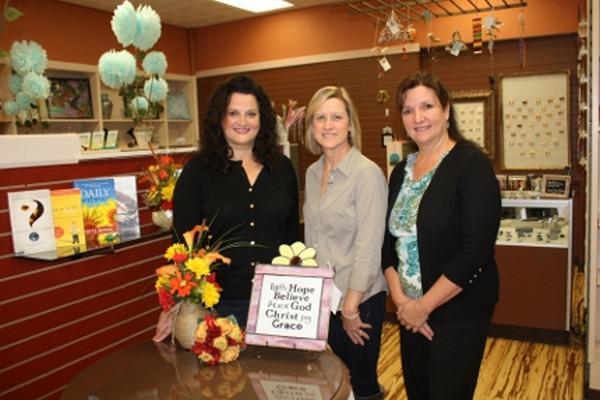 The Connection Point, located at the former The Resource Center at 198 W. First Street in Oswego, will celebrate their grand opening October 18th and 19th. Shown pictured with owner Anne-marie King, right, are, from left, Marian Wallace and Candy Conway. Wallace, the owner of The Posy Affair, and Conway, owner of Conway Stained Glass, will each have their products available at The Connection Point.